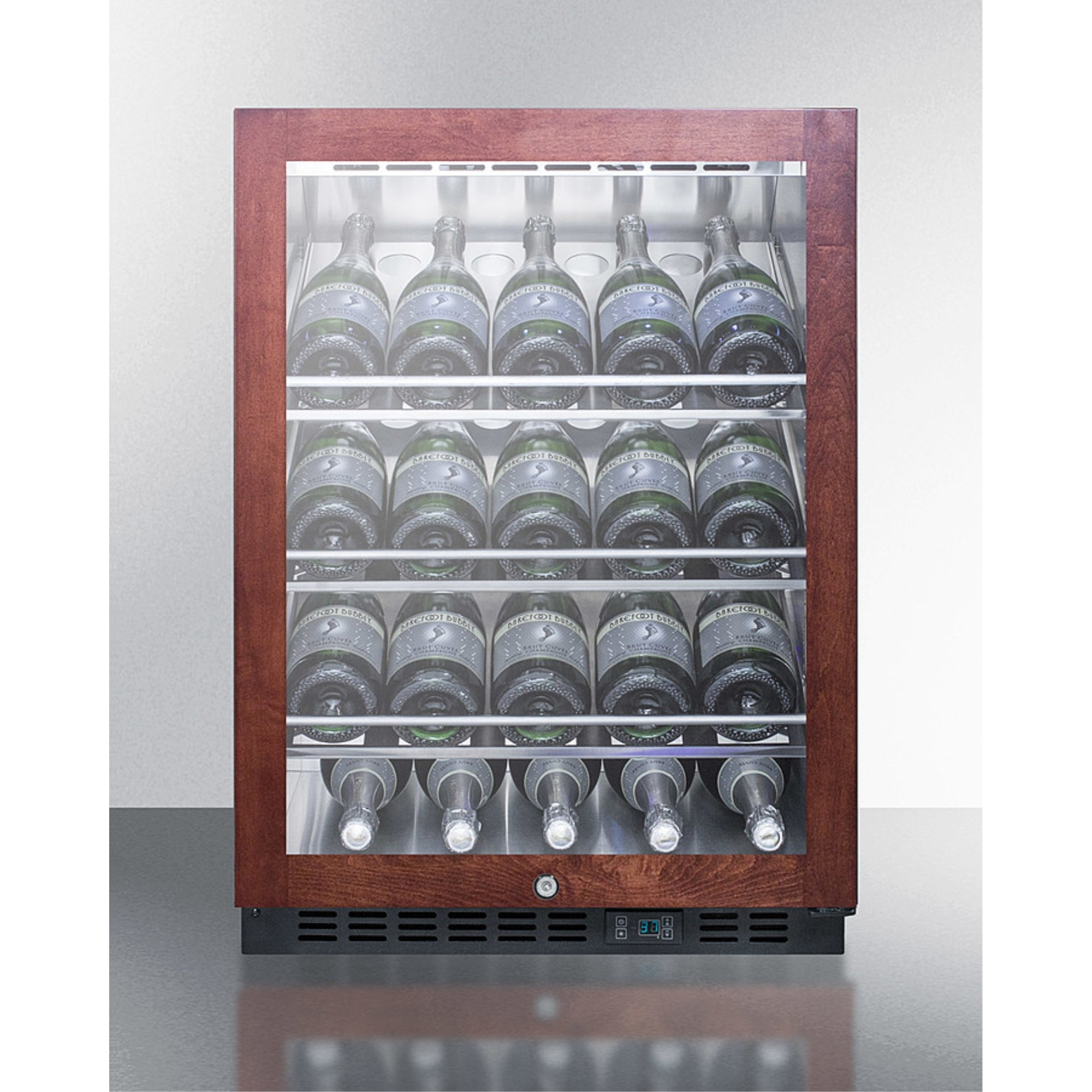 Commercial built-in undercounter wine cellar with champagne style shelving and panel-ready glass door