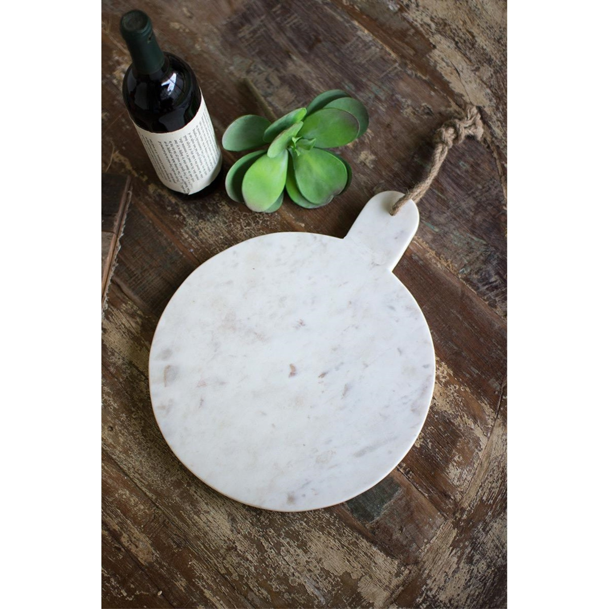 ROUND WHITE MARBLE CUTTING BOARD WITH JUTE HANGER