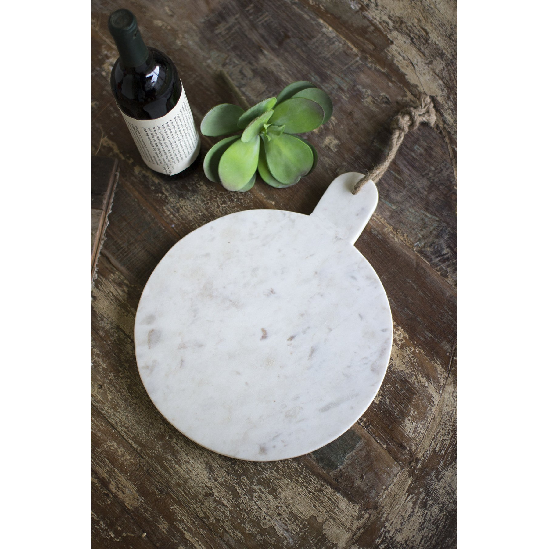 ROUND WHITE MARBLE CUTTING BOARD WITH JUTE HANGER