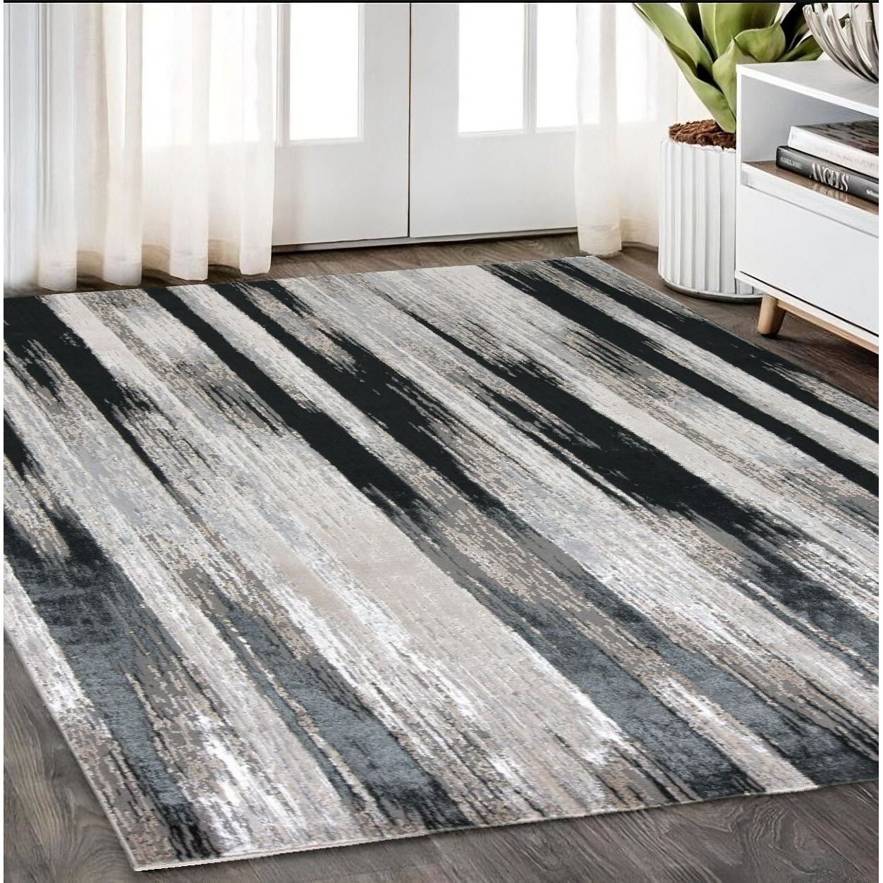 5' X 8' Black Silver and Gray Abstract Power Loom Area Rug
