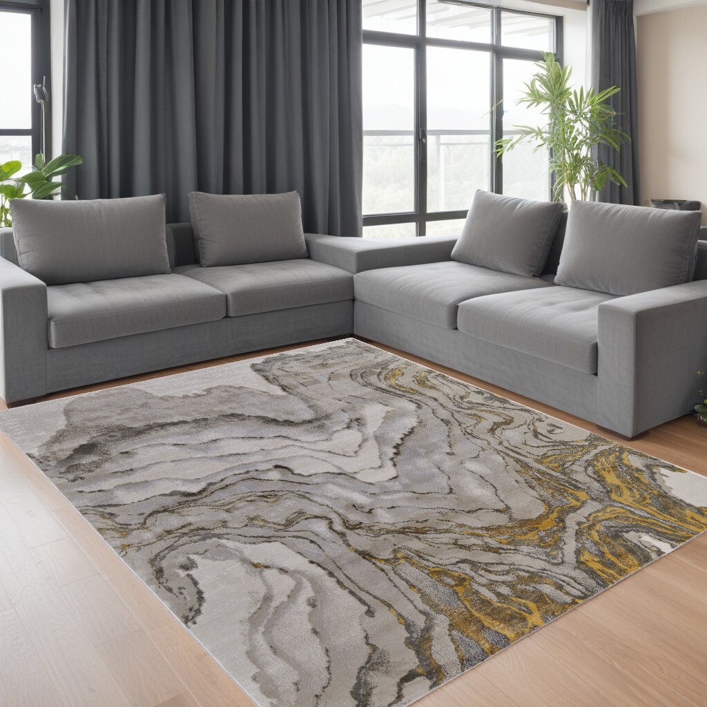 8' X 11' Gold and Ivory Abstract Area Rug