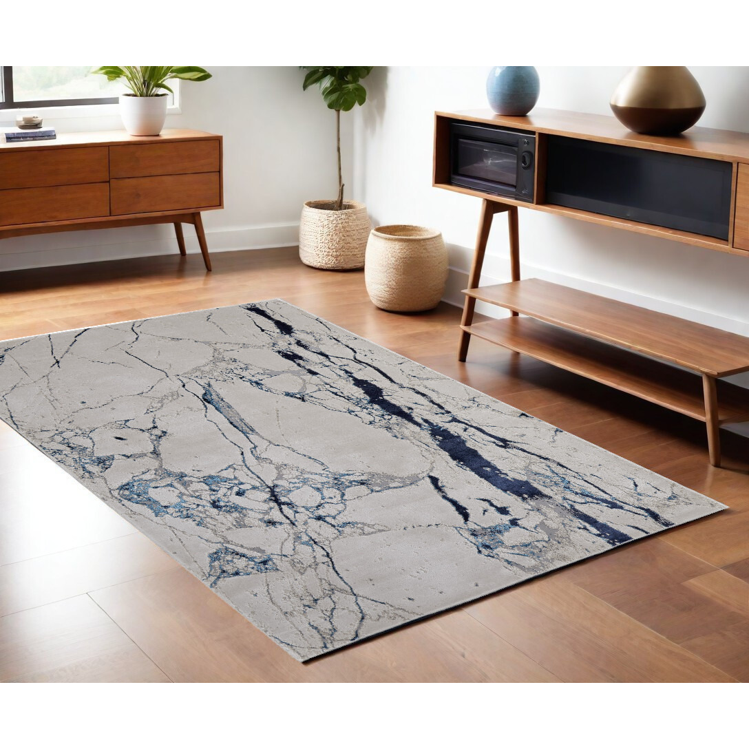 4' X 6' Ivory and Blue Marble Power Loom Distressed Area Rug