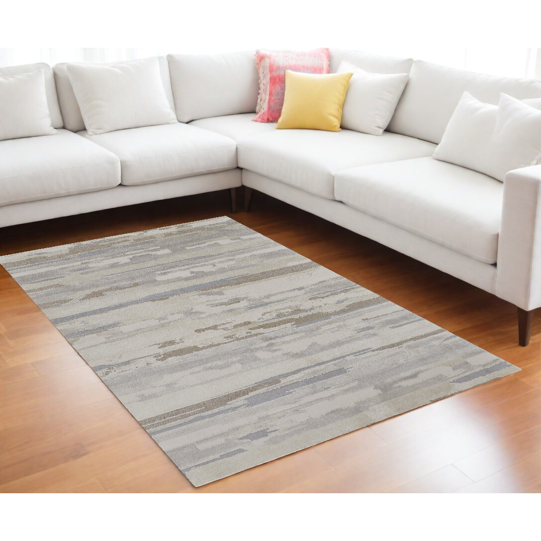 7' X 10' Ivory and Gray Abstract Power Loom Distressed Area Rug