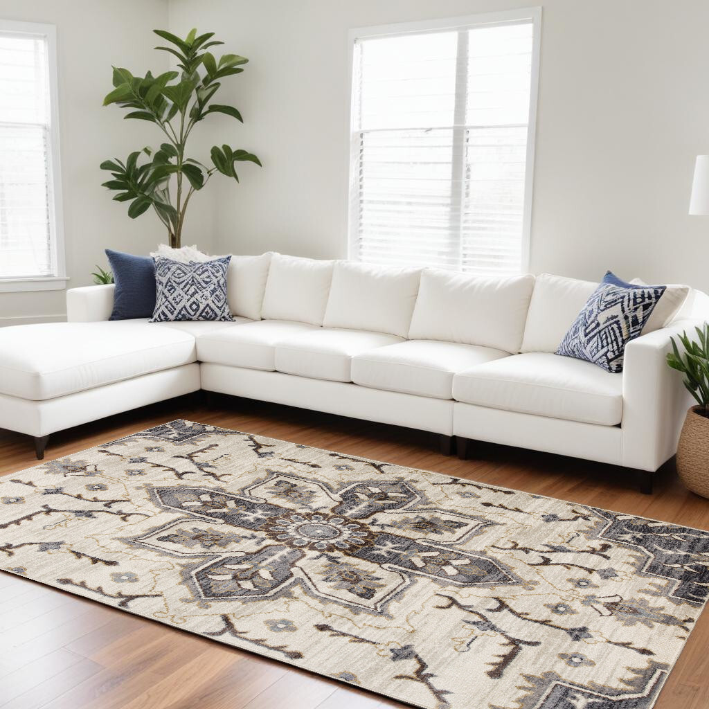 6' X 9' Blue and Beige Medallion Power Loom Area Rug