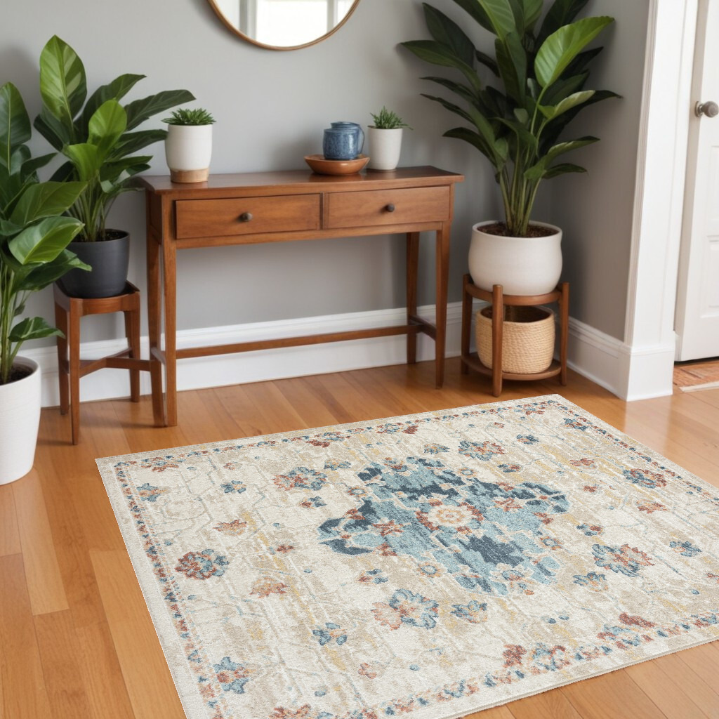 4' X 6' Ivory and Blue Medallion Power Loom Area Rug