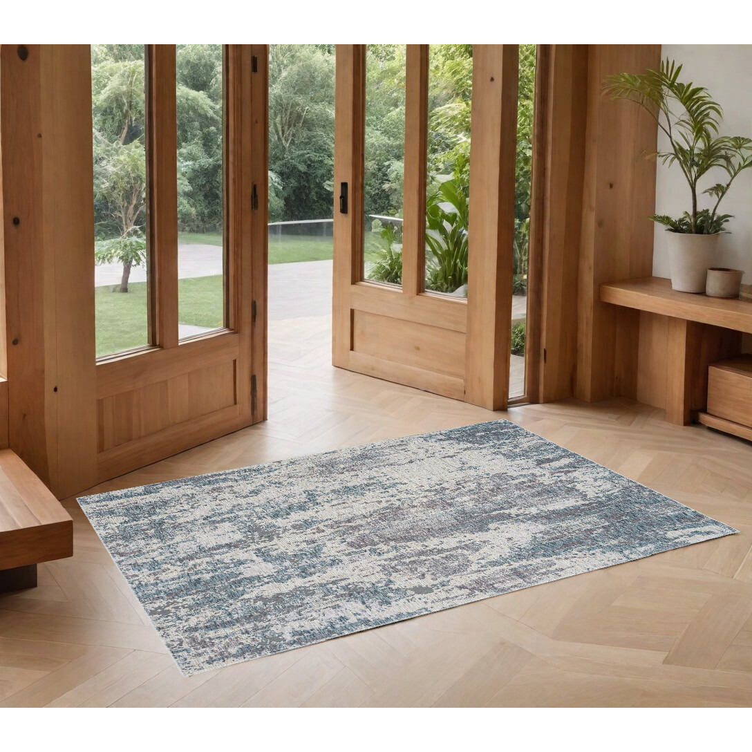 2' X 3' Gray and Ivory Abstract Area Rug