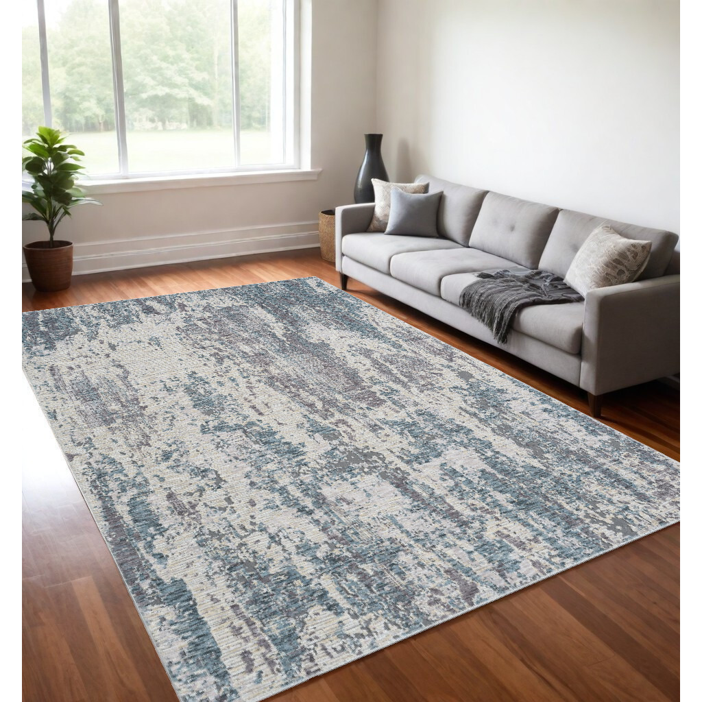 5' X 8' Gray and Ivory Abstract Area Rug