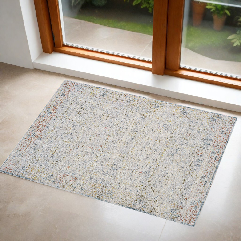 2' X 3' Ivory and Blue Floral Area Rug