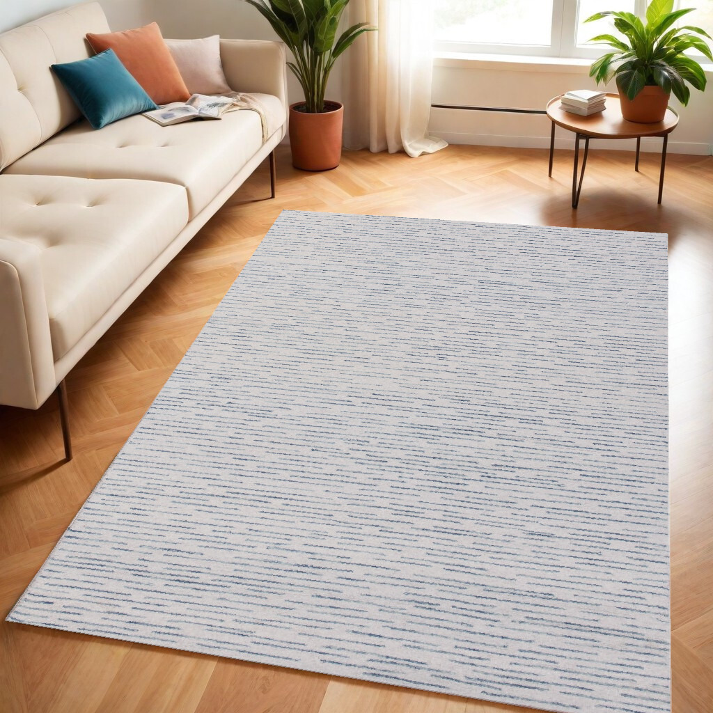 5' X 8' Ivory and Blue Wool Striped Hand Tufted Area Rug