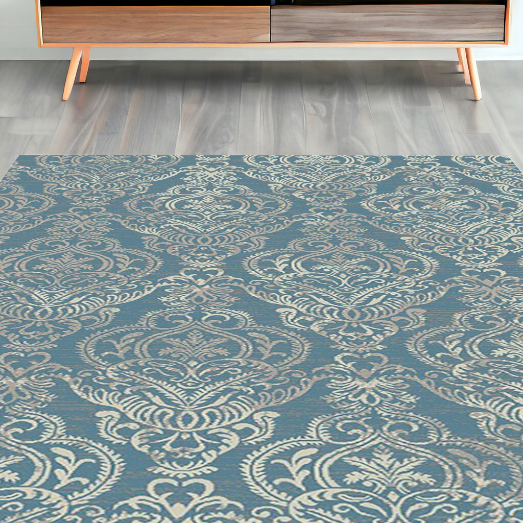5' X 8' Blue and Beige Damask Distressed Area Rug