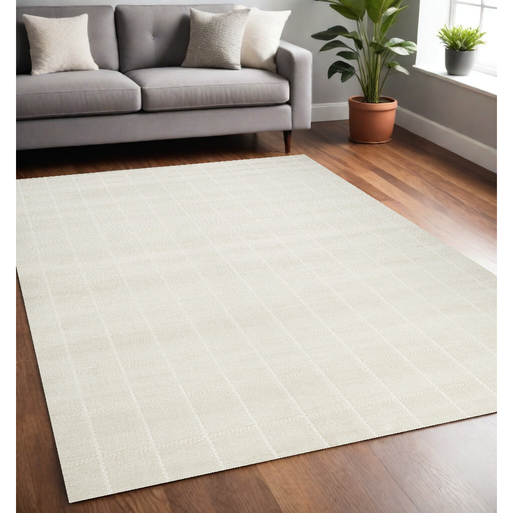 5' X 7' Cream Geometric Area Rug