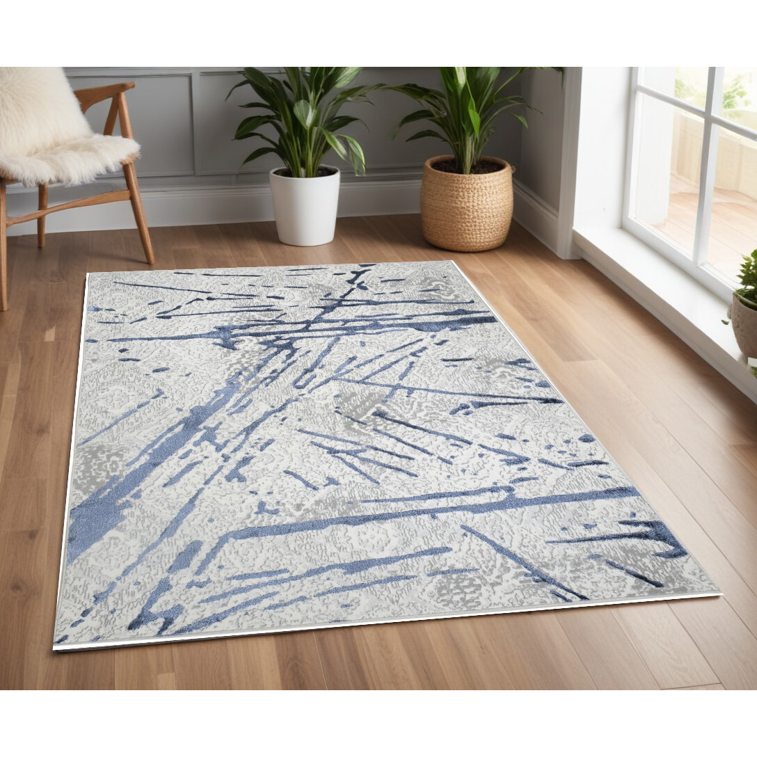 4' X 6' Ivory and Blue Abstract Area Rug