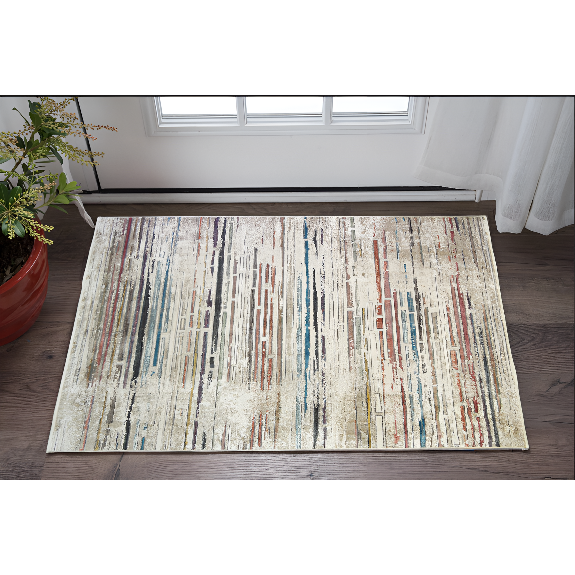 2' X 3' Beige Geometric Distressed Area Rug With Fringe