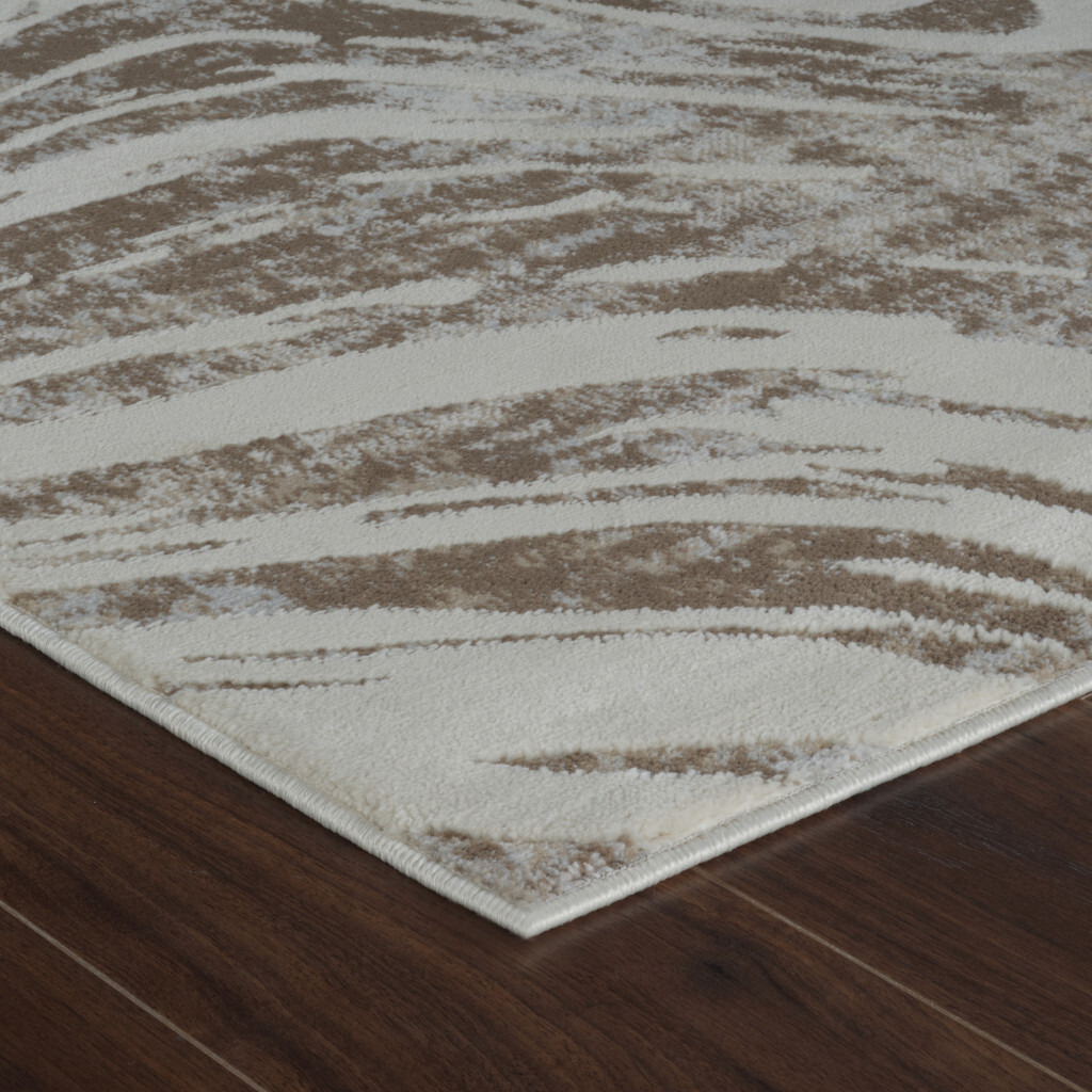 7' X 10' Beige and Brown Abstract Distressed Area Rug