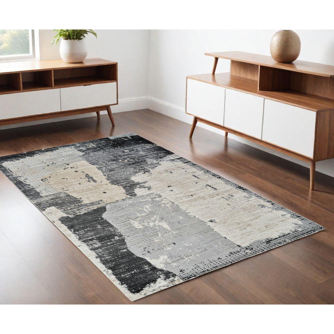4' X 6' Beige and Black Abstract Distressed Area Rug