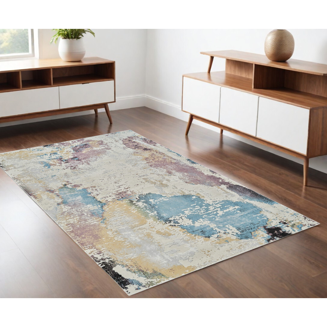 4' X 6' Beige and Blue Abstract Distressed Area Rug