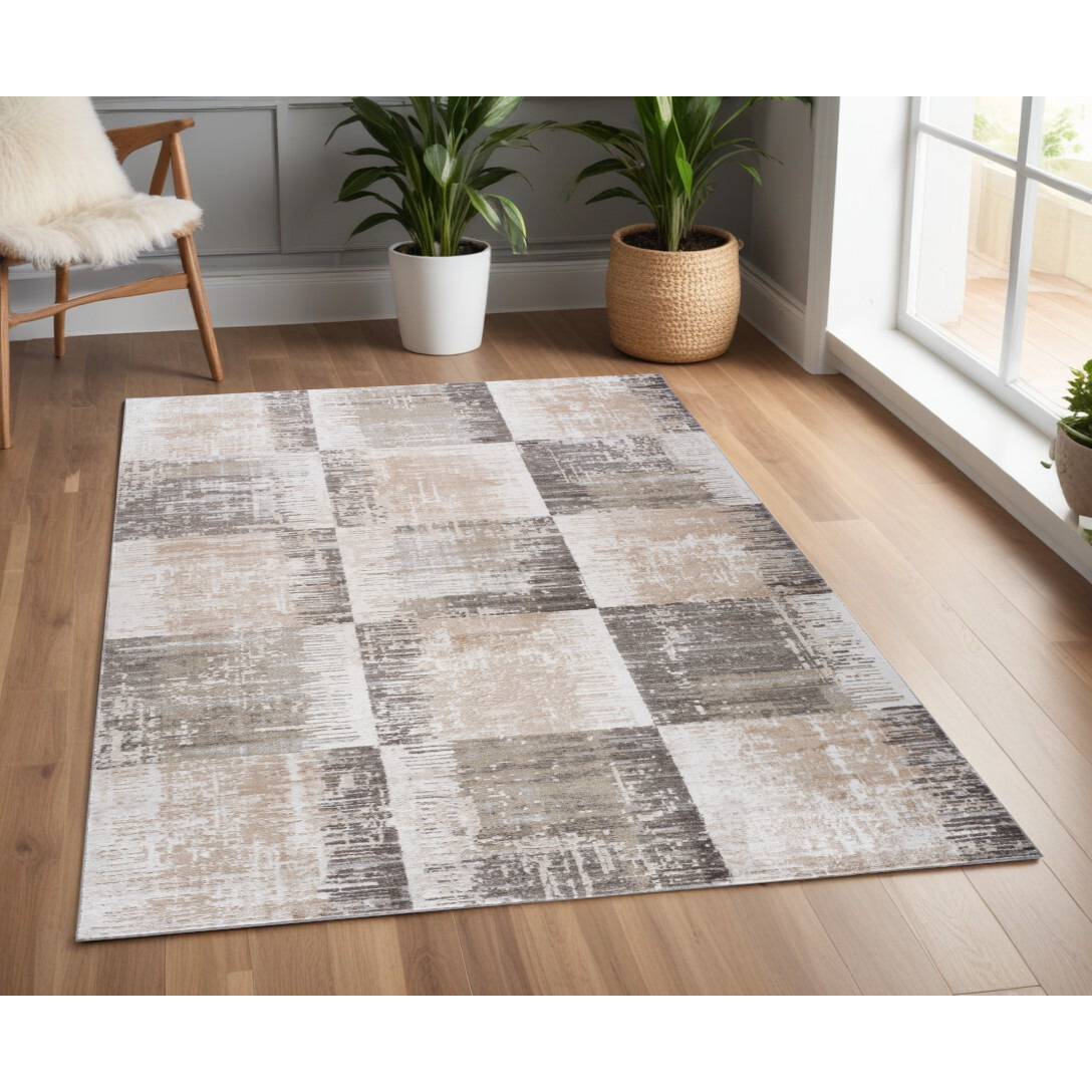 4' X 6' Beige and Brown Abstract Distressed Area Rug