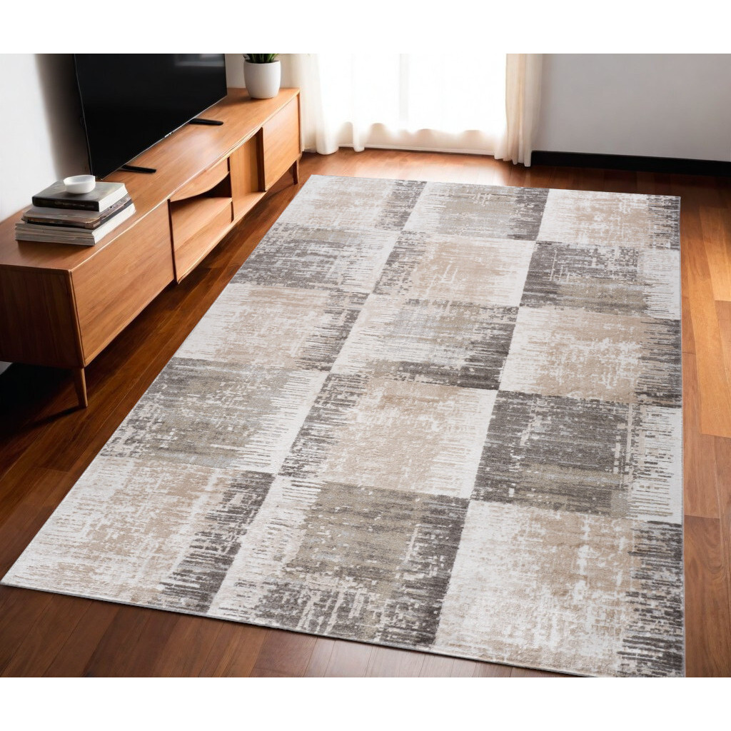 5' X 8' Beige and Brown Abstract Distressed Area Rug