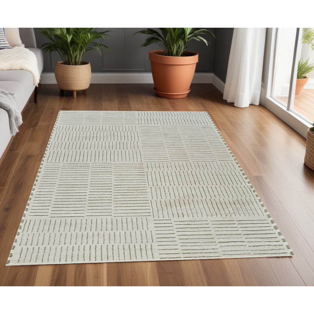 4' X 6' Cream and Green Abstract Distressed Area Rug