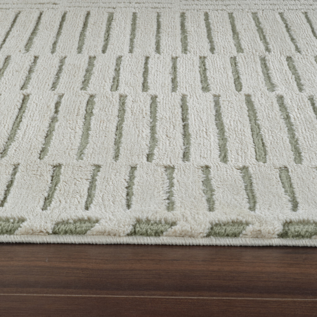 4' X 6' Cream and Green Abstract Distressed Area Rug