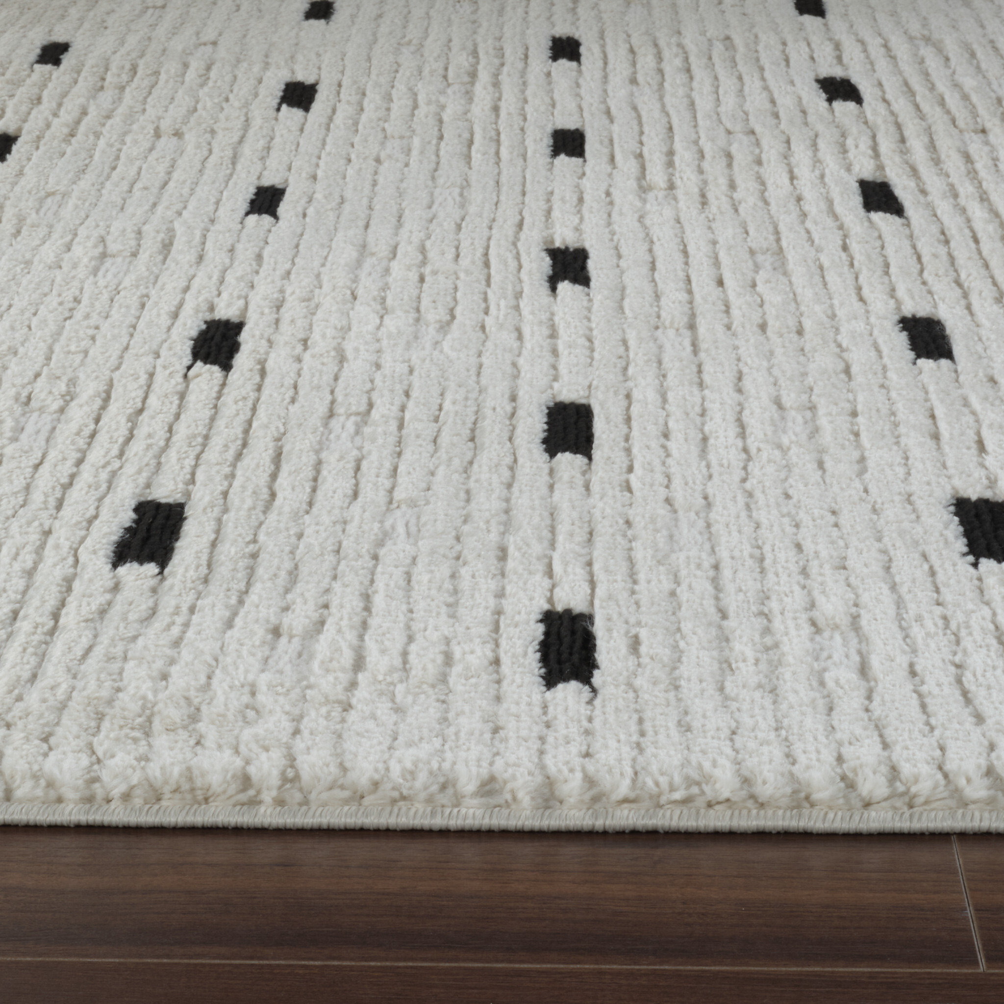 5' X 8' Cream and Black Abstract Distressed Area Rug