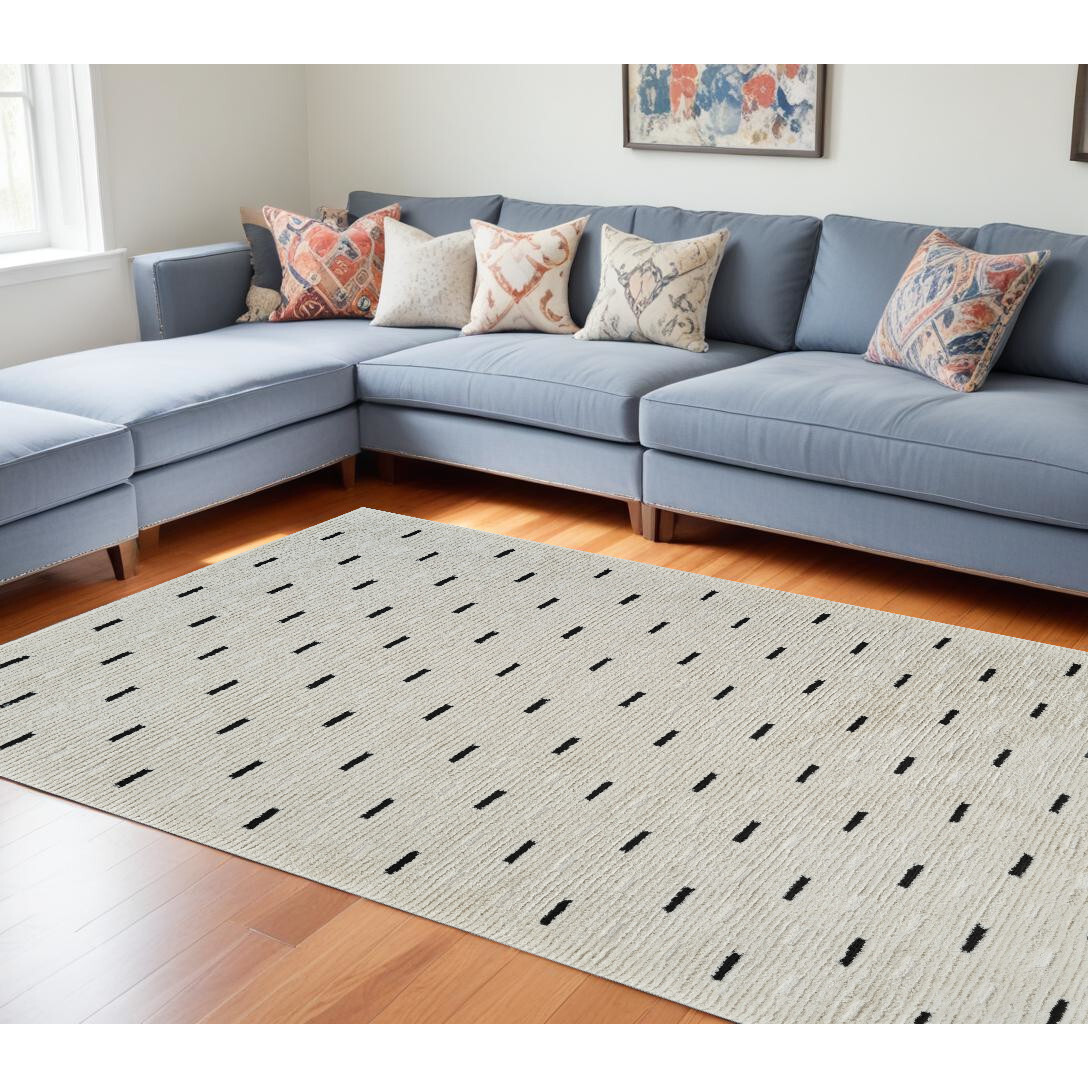 7' X 10' Cream and Black Abstract Distressed Area Rug