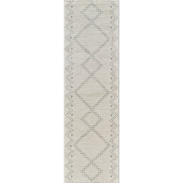 8' Cream and Beige Abstract Distressed Area Rug