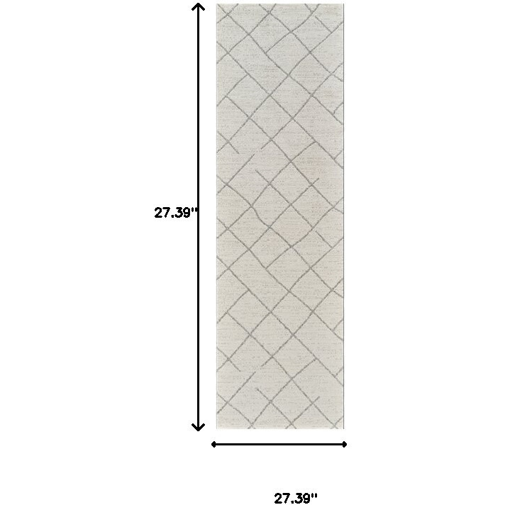 8' Cream and Beige Abstract Distressed Area Rug
