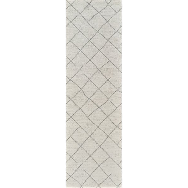 8' Cream and Beige Abstract Distressed Area Rug