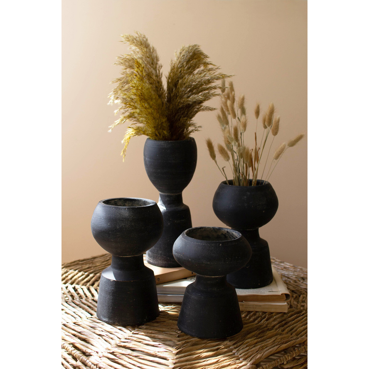 SET OF FOUR BLACK CLAY VASES