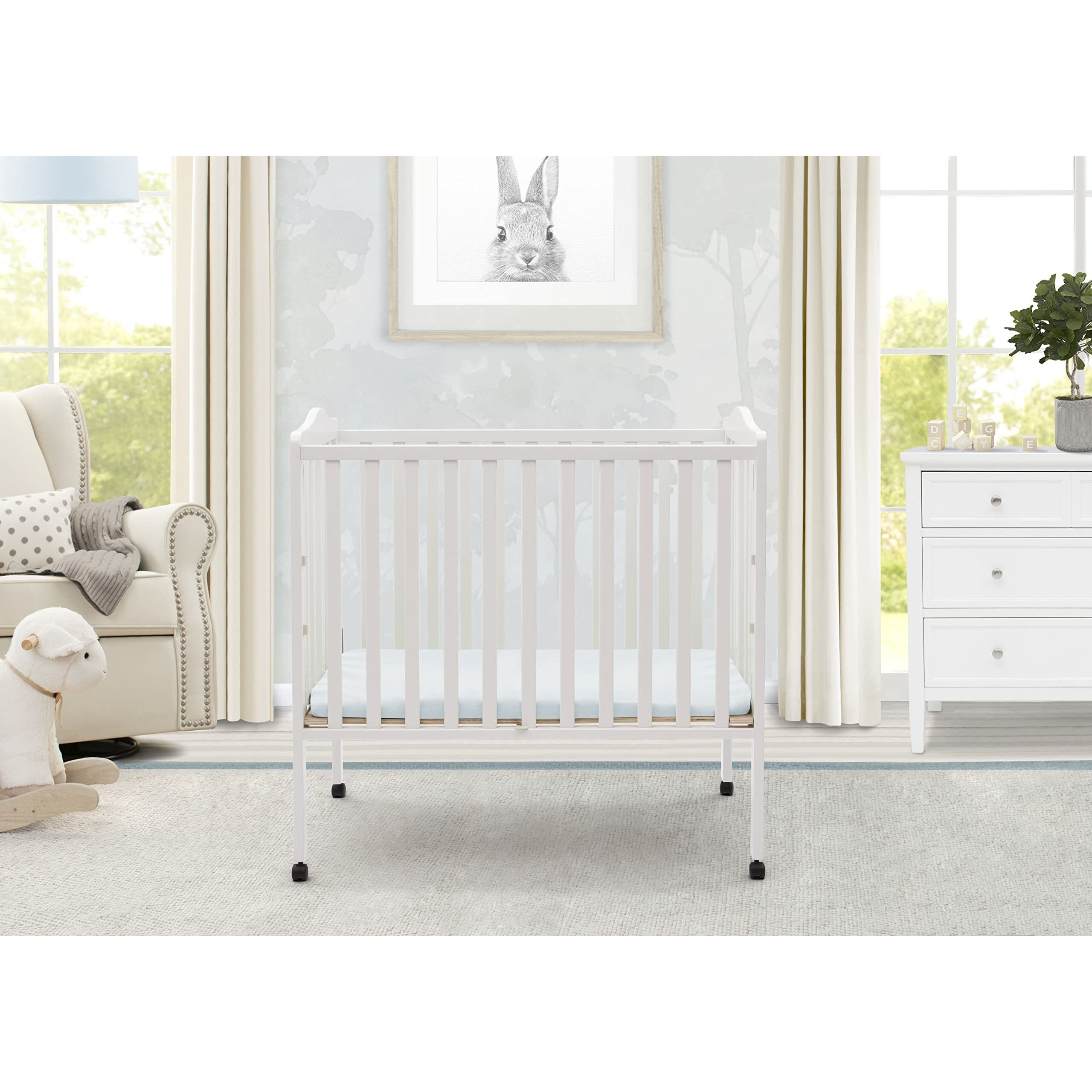 Delta Children Folding Portable Mini Baby Crib With 1.5-Inch Mattress - Greenguard Gold Certified, White