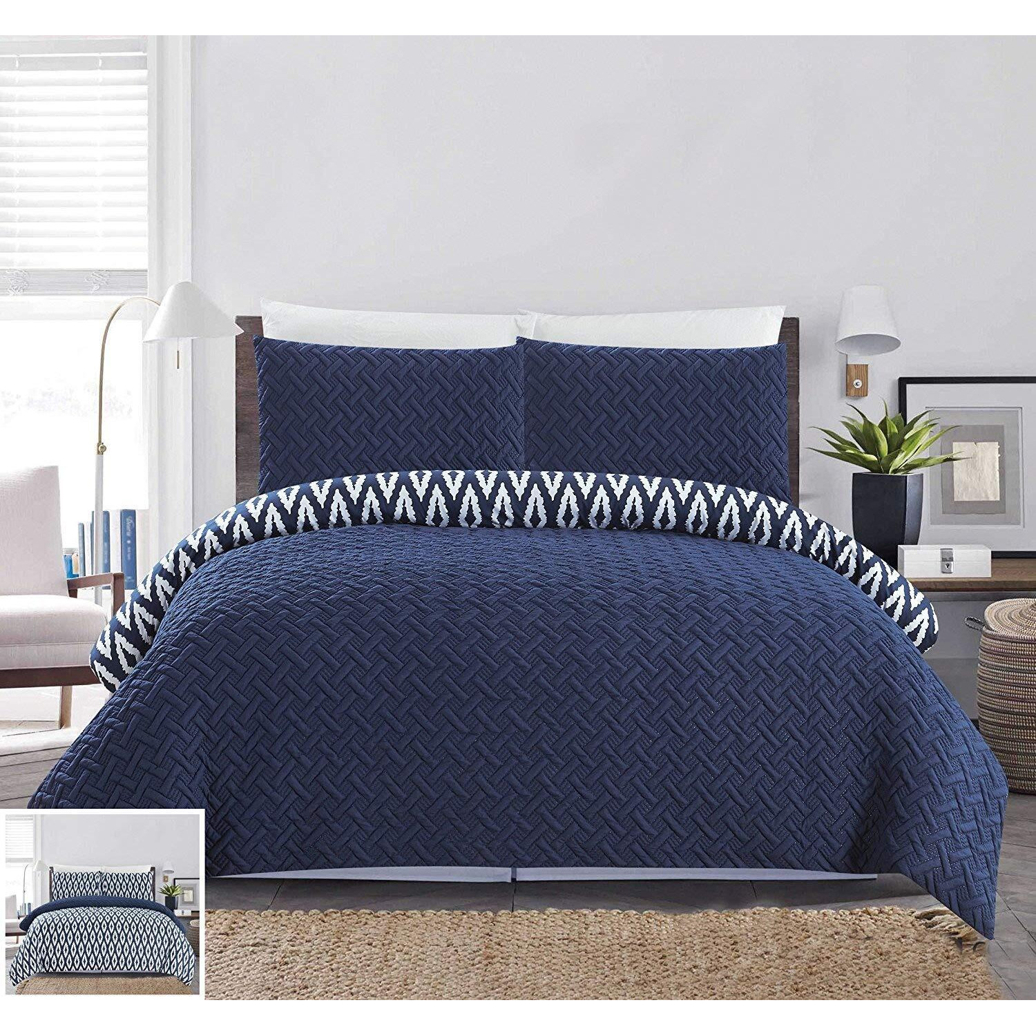 Chic Home 3 Piece Ora Heavy Embossed And Embroidered Quilted Geometrical Pattern Reversible Printed King Comforter Set Navy