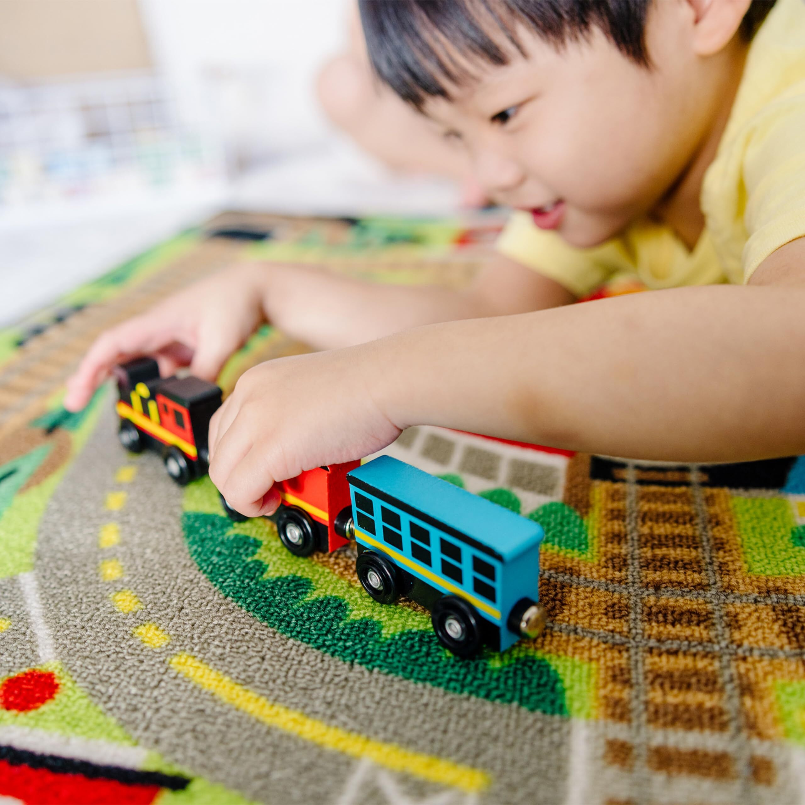 Melissa & Doug Round The Rails Train Activity Play Rug, 3 Wooden Train Cars (39"" X 36"")