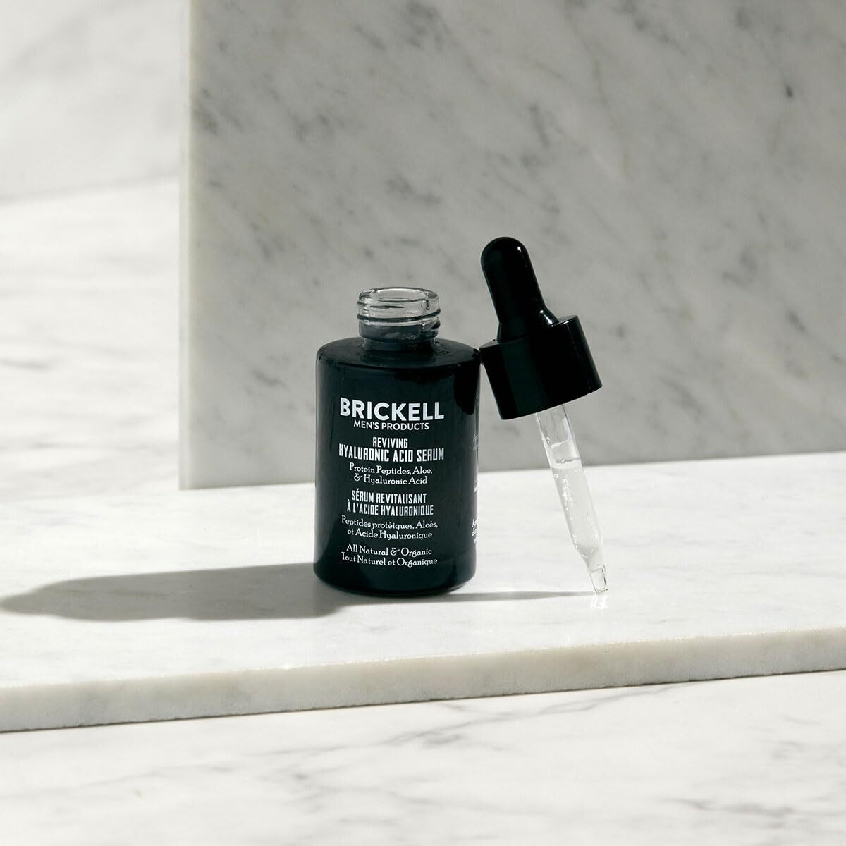 Brickell Men's Anti Aging Hyaluronic Acid Serum For Face, Reviving Day Serum For Men, Natural And Organic Face Serum With Protein Peptides To Restore Firmness And Collagen, 1 Ounce, Scented