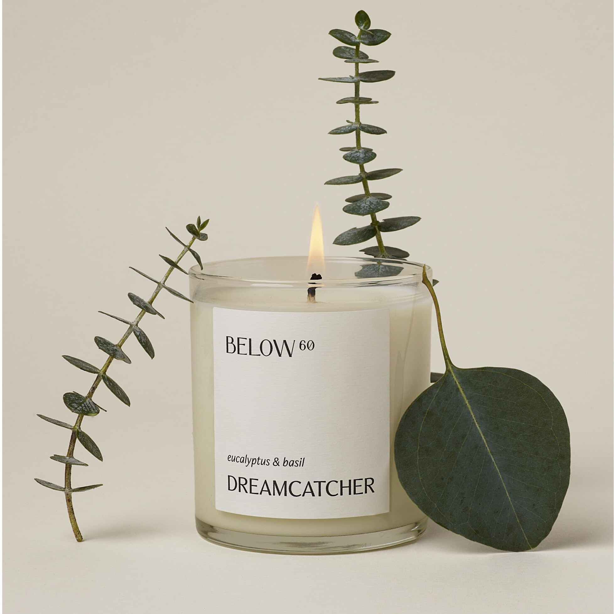 Below 60 Scented Candle - Dreamcatcher - Essential Oil-Based Fragrance - Hand-Made With Paraffin-Free Soy Wax - 100% Cotton Wick - 50 Hr Burn Time - Founded By Hilary Duff - Eucalyptus & Basil (10Oz)