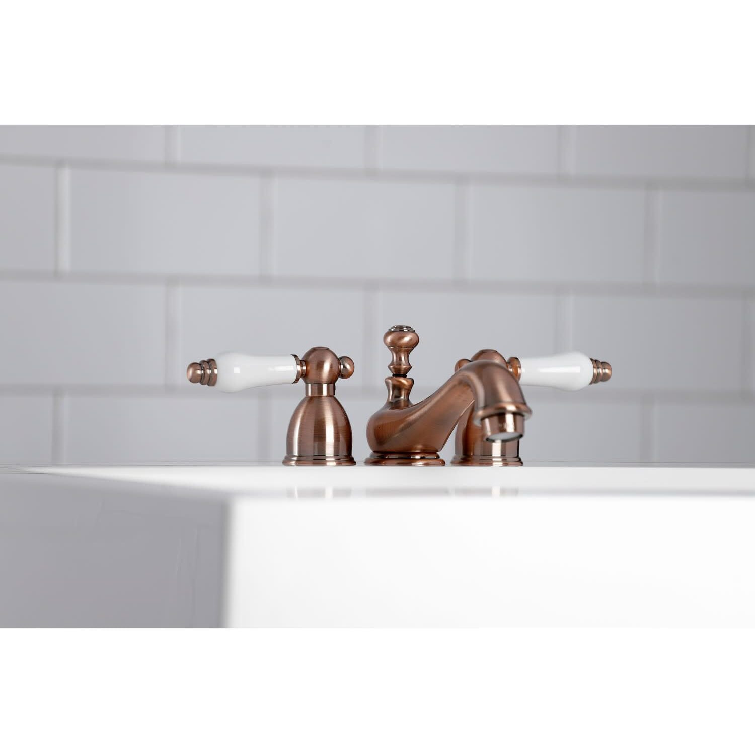 Kingston Brass Ks3955Pl Restoration Mini Widespread Lavatory Faucet With Porcelain Lever Handle, Oil Rubbed Bronze