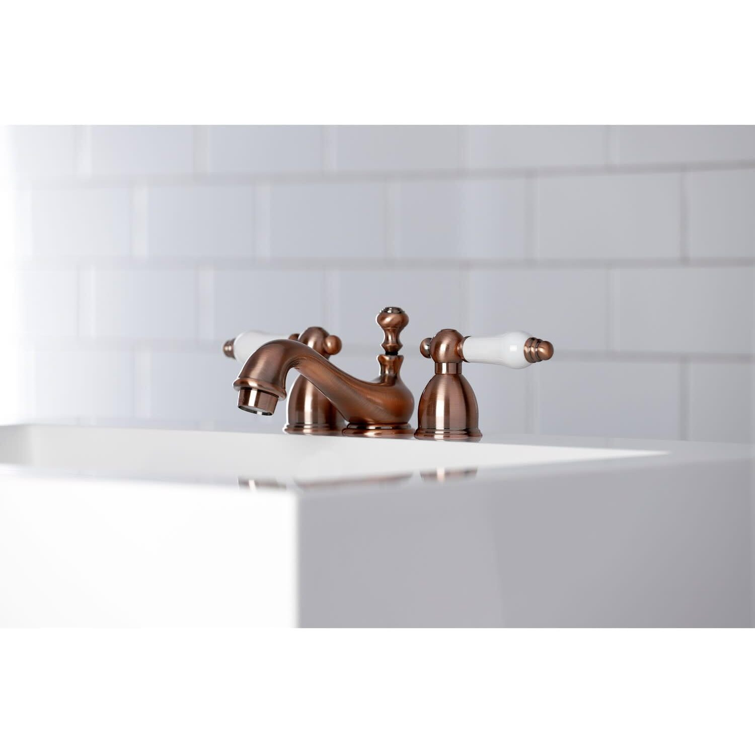 Kingston Brass Ks3955Pl Restoration Mini Widespread Lavatory Faucet With Porcelain Lever Handle, Oil Rubbed Bronze