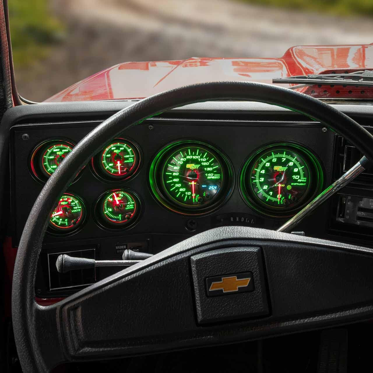 Glowshift 6-Gauge Cluster Package Compatible With Chevy C10 1973-1987 - Black 7 Color Speedometer, Tach, Oil Pressure, Water Coolant Temp, Fuel Level & Volt Gauges - Direct Fit Dashboard Panel Pod