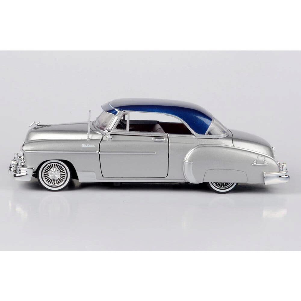 1950 Chevrolet Bel Air Lowrider Silver Metallic with Blue Metallic Top &quotGet Low" Series 1/24 Diecast Model Car by Motormax