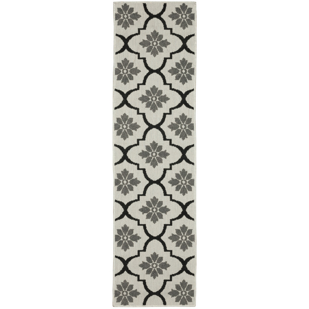 2 X 7 Beige and Black geometric Stain Resistant Indoor Outdoor Area Rug