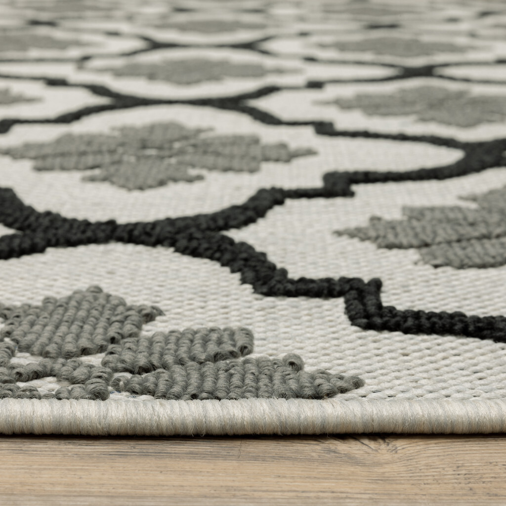 3 X 5 Beige and Black geometric Stain Resistant Indoor Outdoor Area Rug