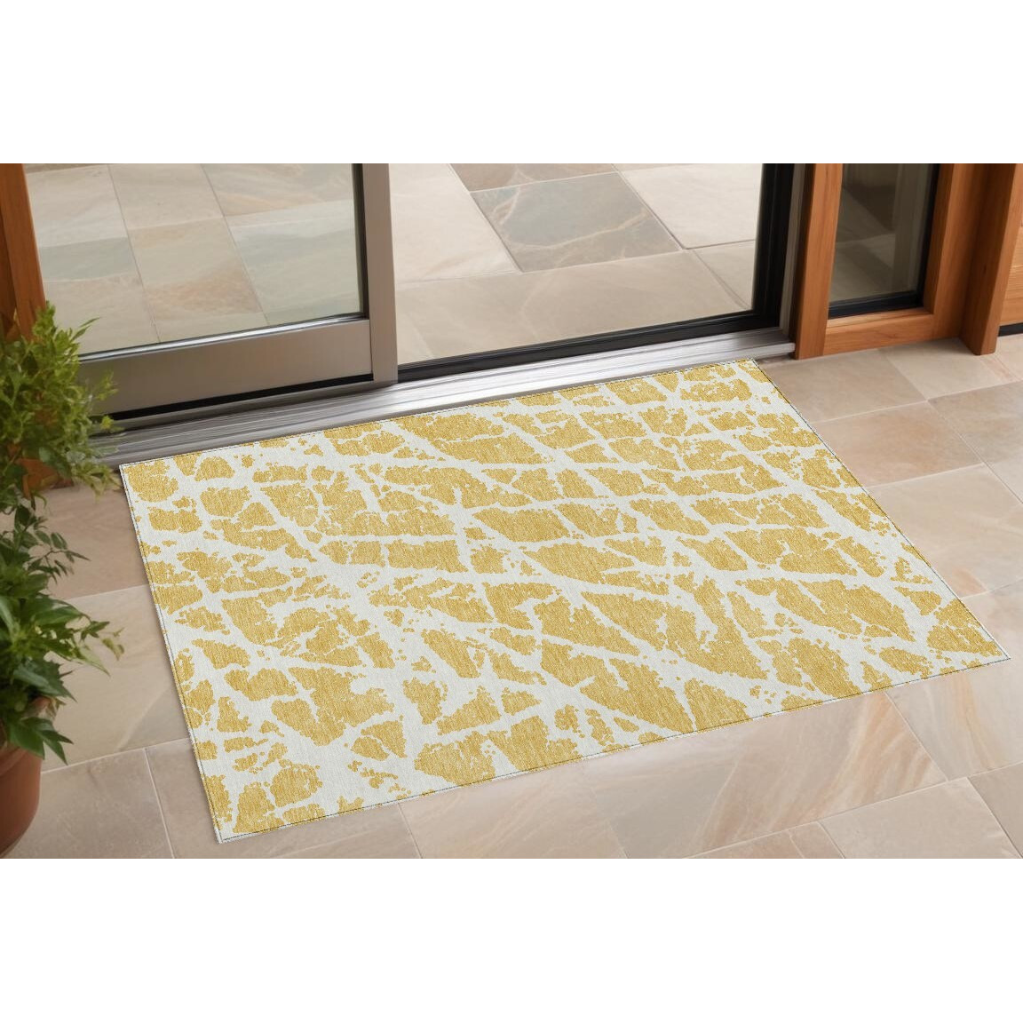 2' X 3' Gold and White Abstract Washable Non Skid Indoor Outdoor Area Rug