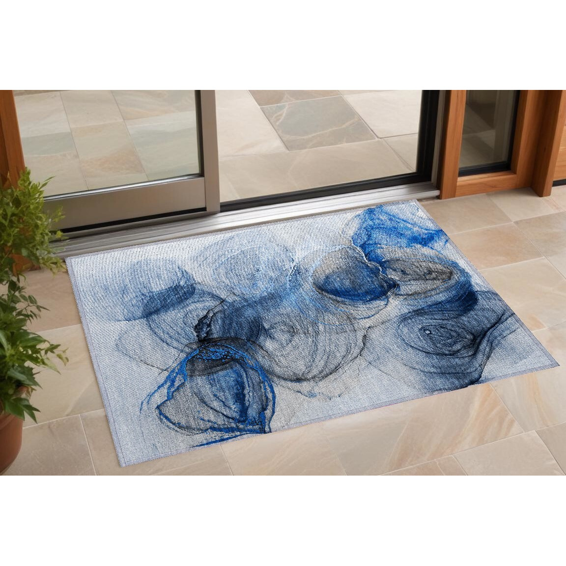 2' X 3' Ivory Blue and Gray Abstract Washable Non Skid Indoor Outdoor Area Rug