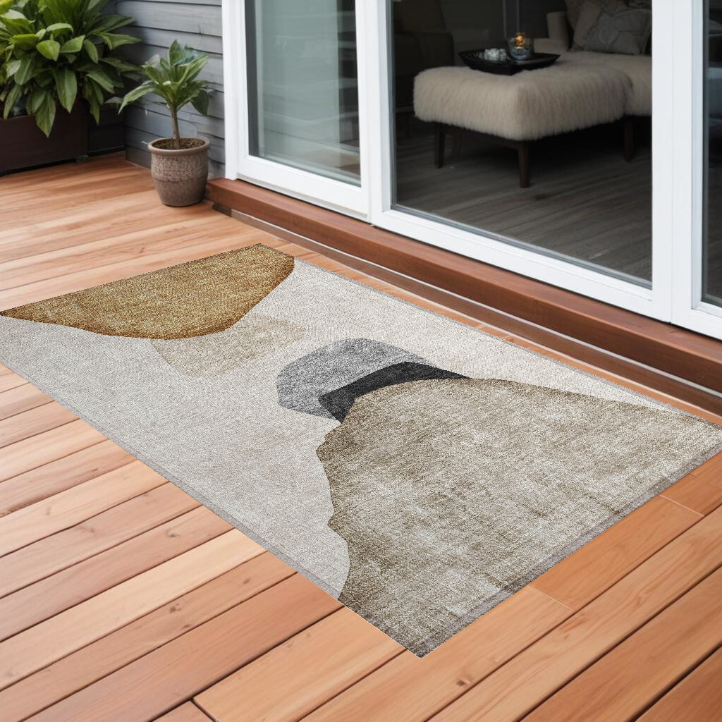 2' X 3' Tan Brown and Gray Abstract Washable Non Skid Indoor Outdoor Area Rug