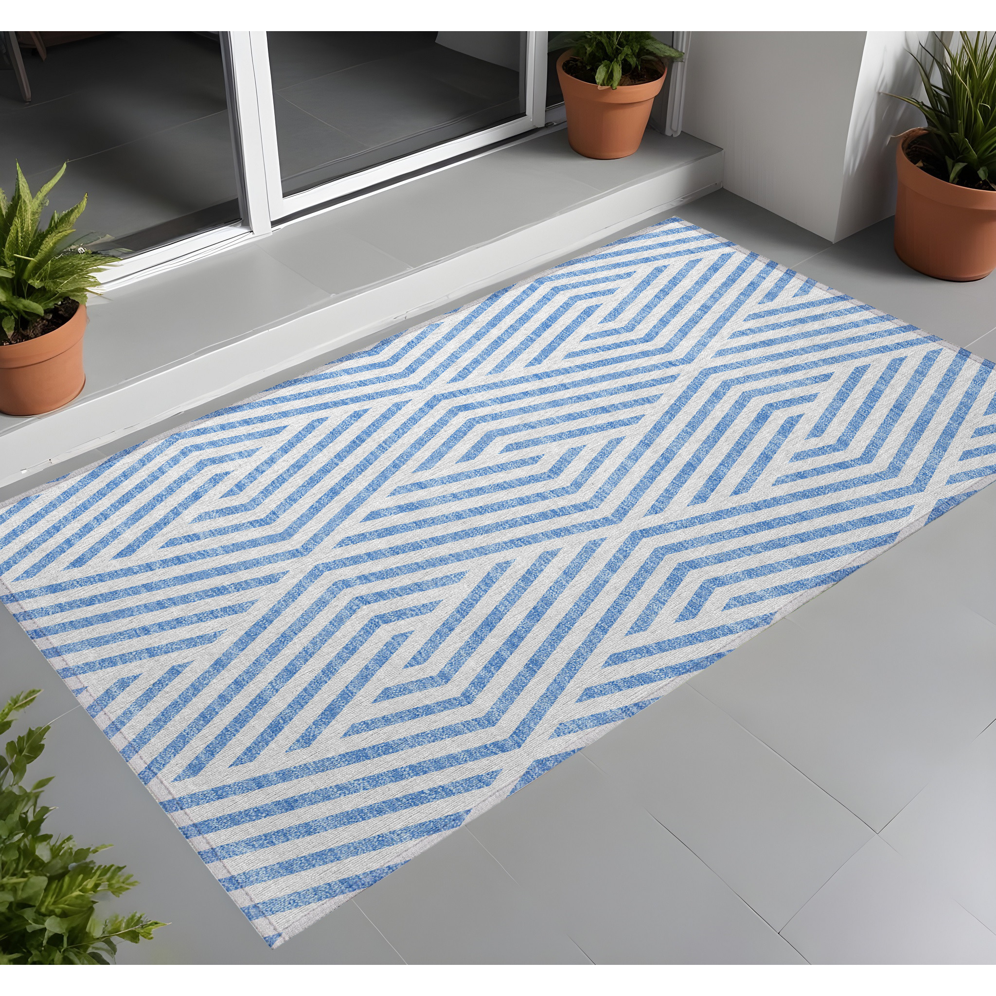 2' X 3' Blue and Ivory Geometric Washable Non Skid Indoor Outdoor Area Rug