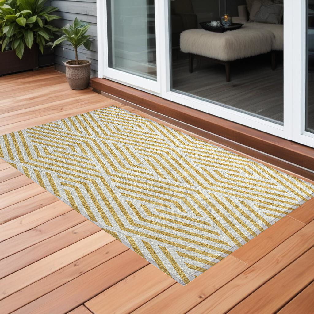 2' X 3' Gold and White Geometric Washable Non Skid Indoor Outdoor Area Rug