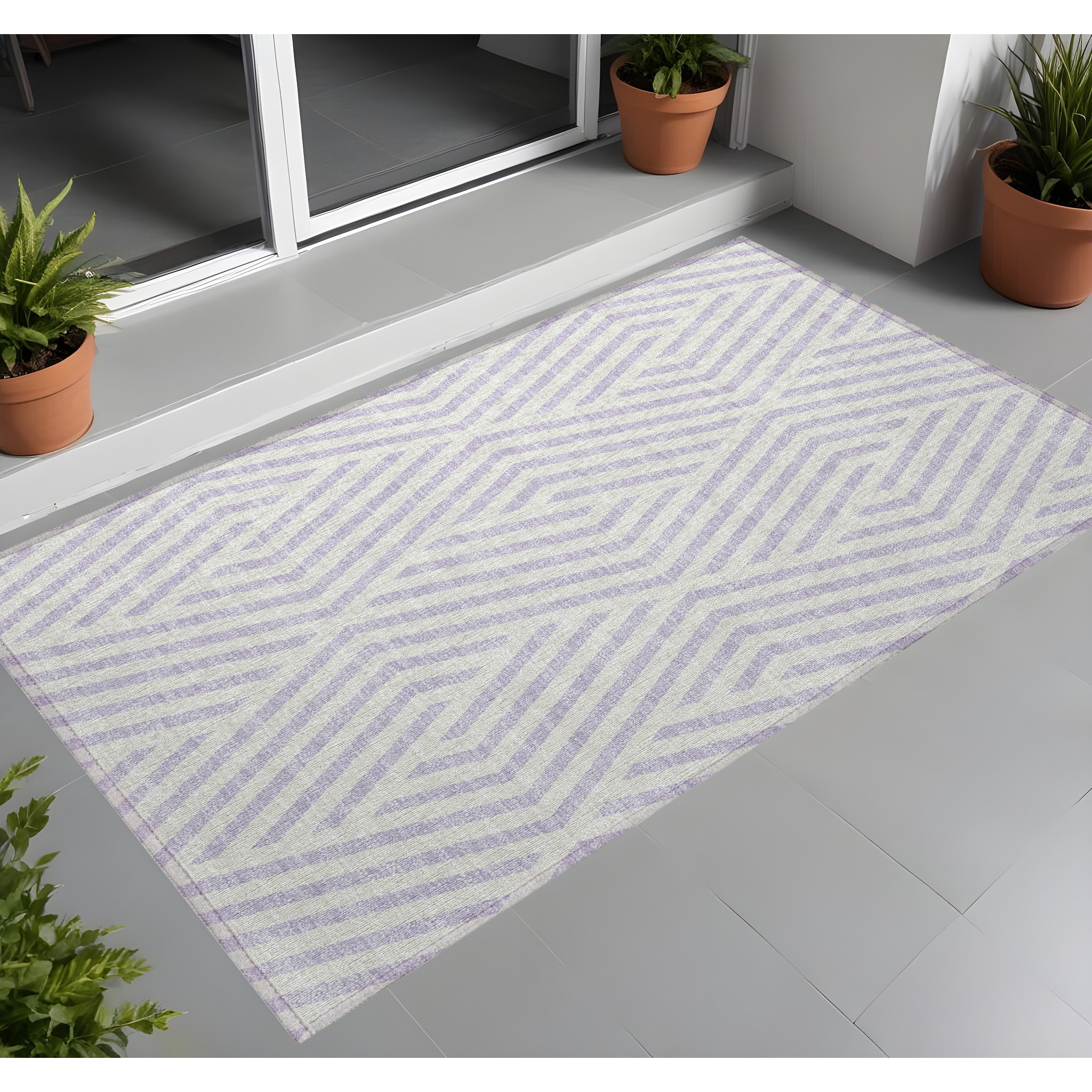 2' X 3' Lavender and Ivory Geometric Washable Non Skid Indoor Outdoor Area Rug