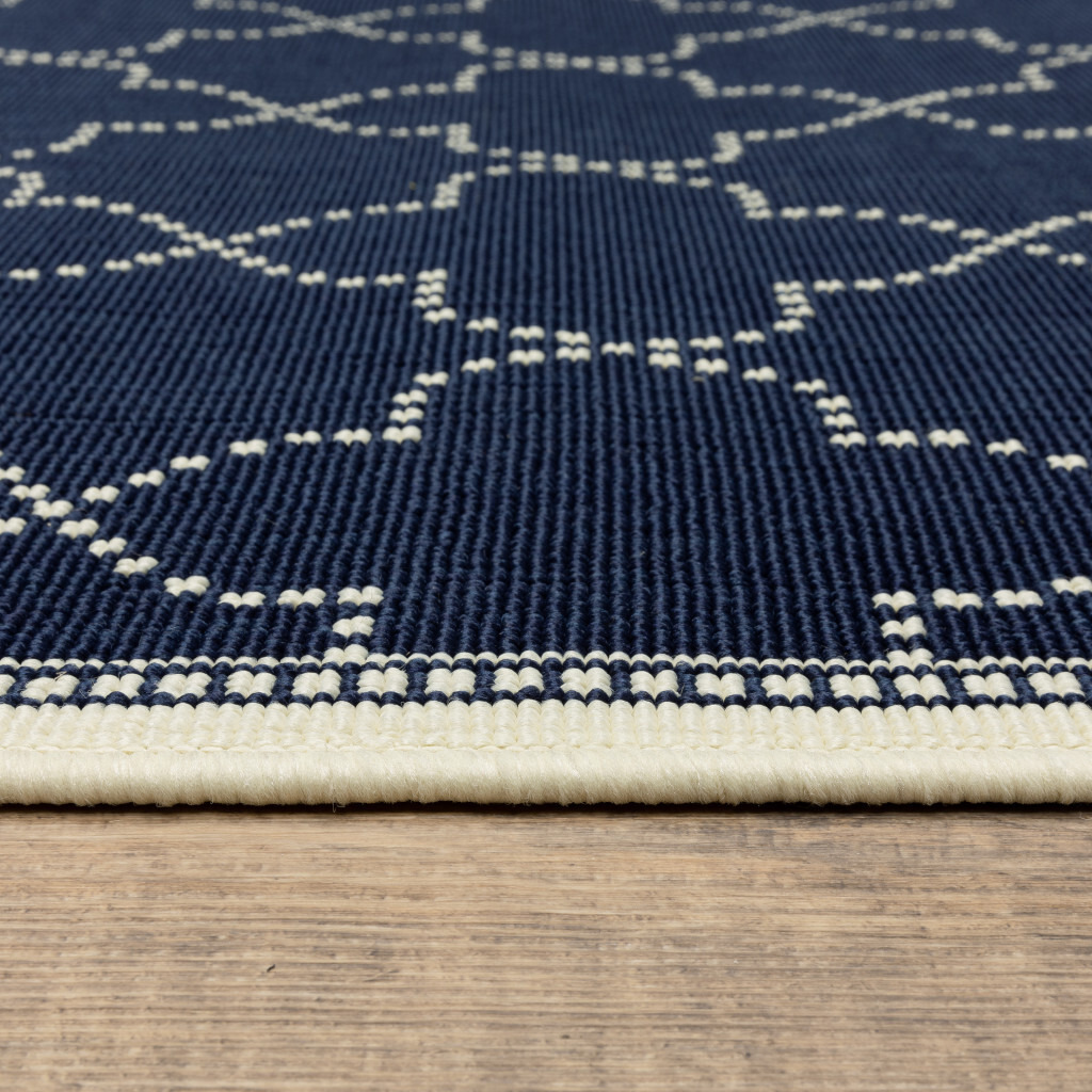 2 X 4 Blue and Ivory geometric Stain Resistant Indoor Outdoor Area Rug