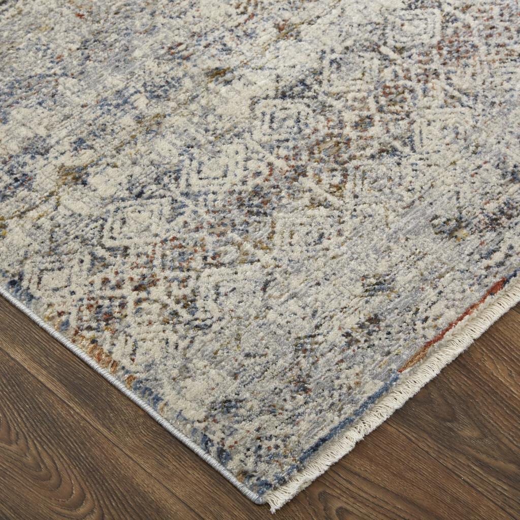 2 X 3 Tan Ivory And Blue geometric Power Loom Distressed Area Rug With Fringe