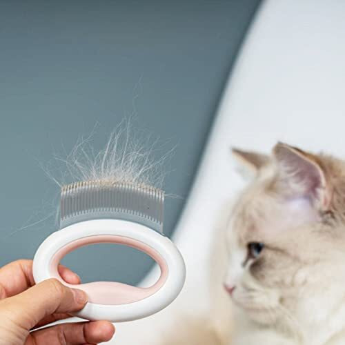 Pet Life  'Knuckler' Handheld Travel Flexible Grooming Pet Rake Comb(D0102HAX2EU.)